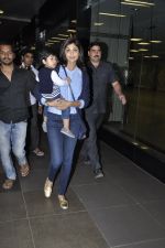 Shilpa Shetty with her Son snapped at the airport in Mumbai on 5th Jan 2014